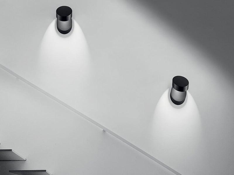 Modern wall lamp family featuring multiple finishes and contemporary designs.