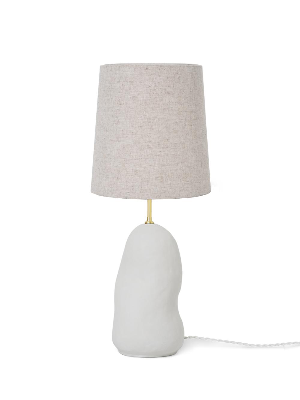 Scandinavian table lamp photographed on a clean white background showcasing natural materials and minimalist Nordic design.