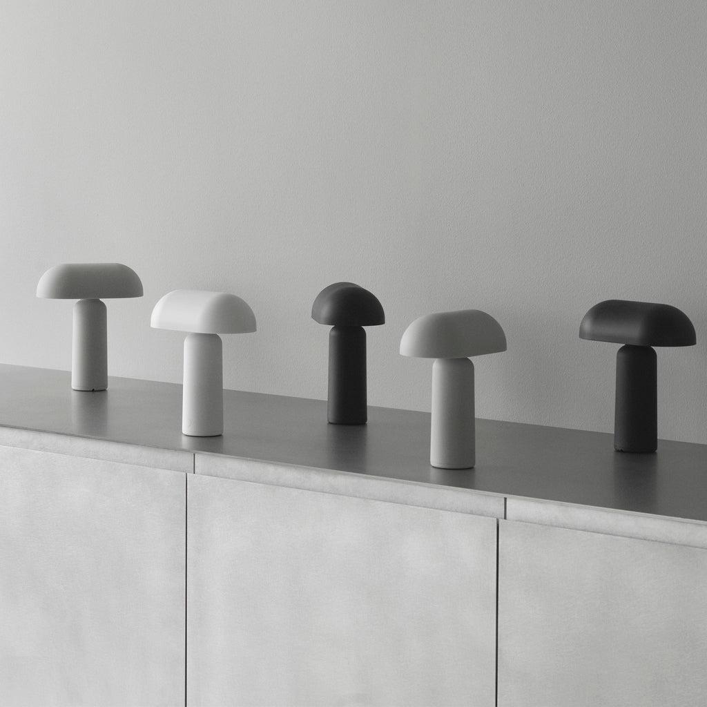 Collection of Scandinavian table lamps featuring wood, metal and fabric combinations inspired by Nordic interiors.