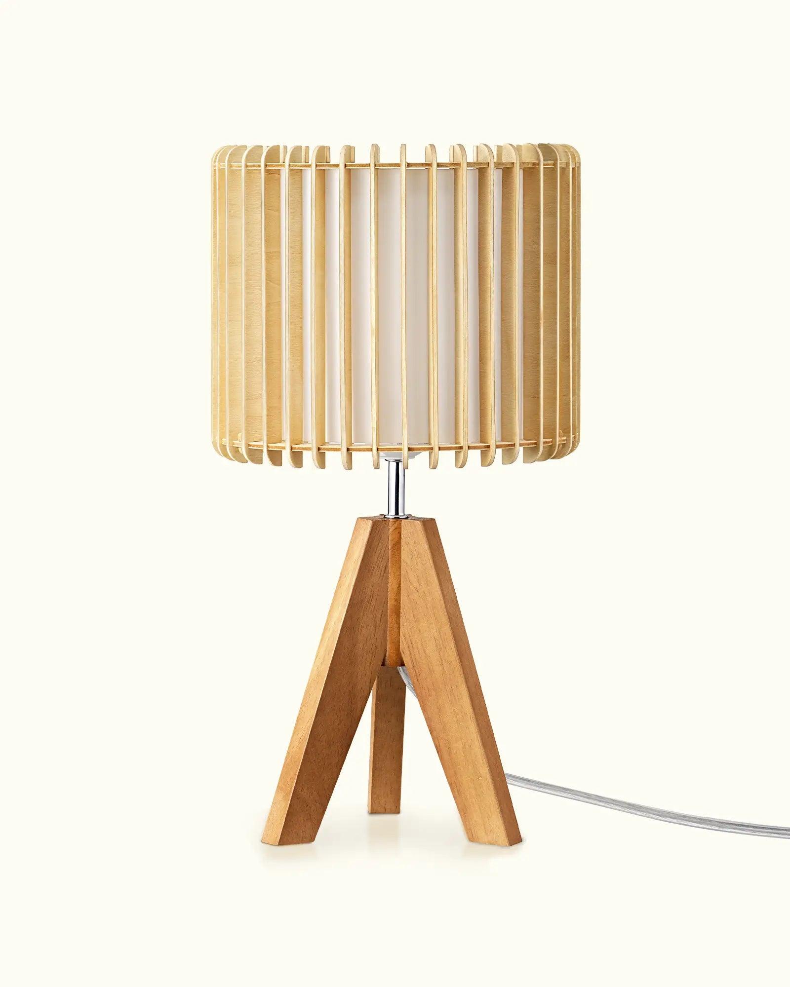 Scandinavian table lamp photographed on a clean white background showcasing natural materials and minimalist Nordic design.