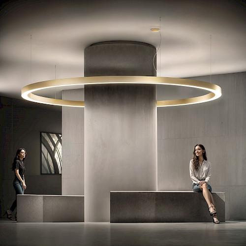 Ring pendant lighting installed in a modern office lobby.