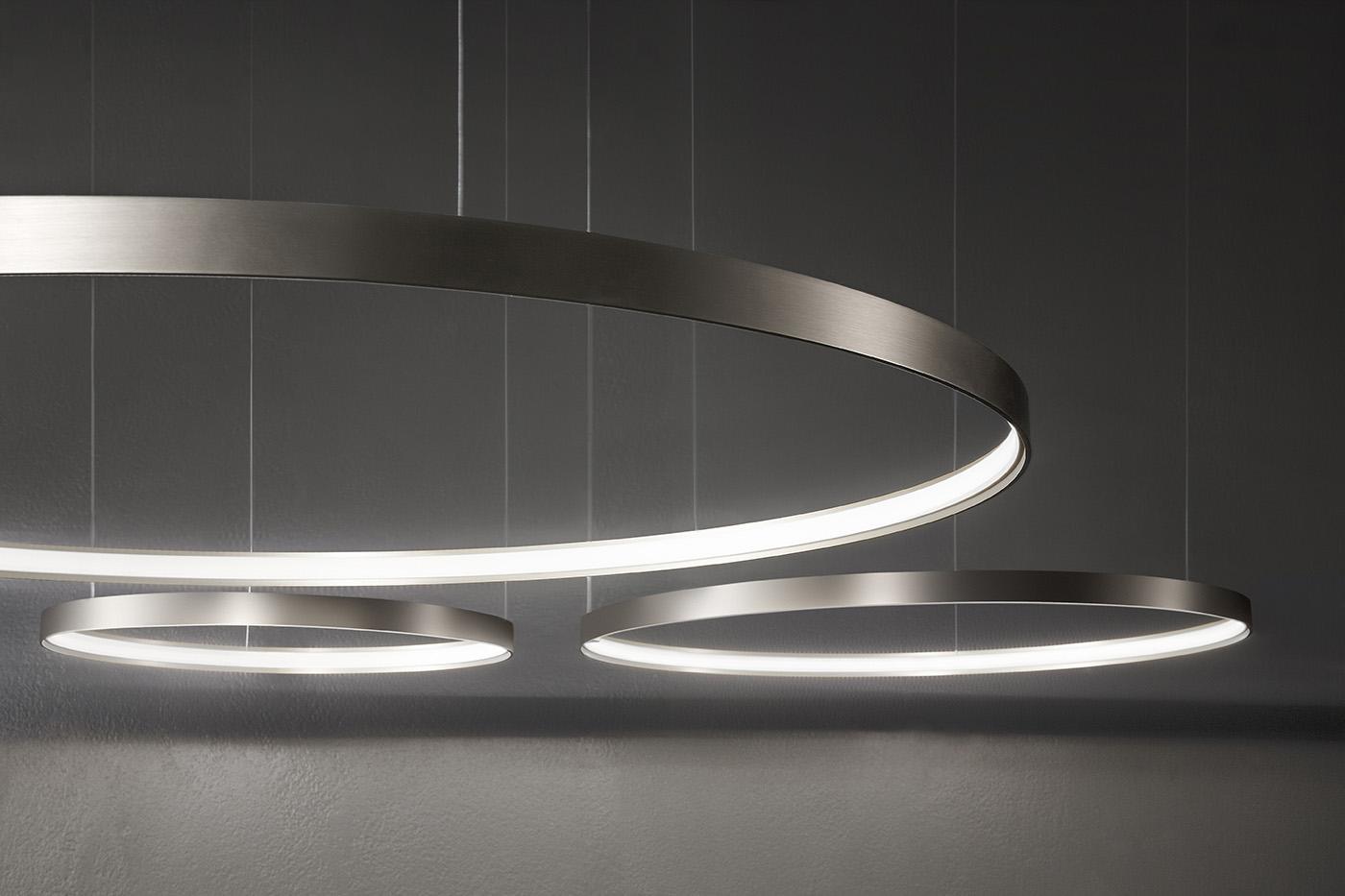 Ring pendant lighting family featuring multiple diameters and configurations.
