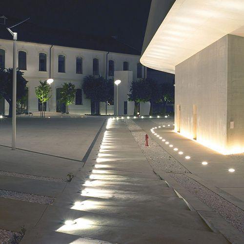 Drive over inground lights installed in a contemporary driveway and public infrastructure project.