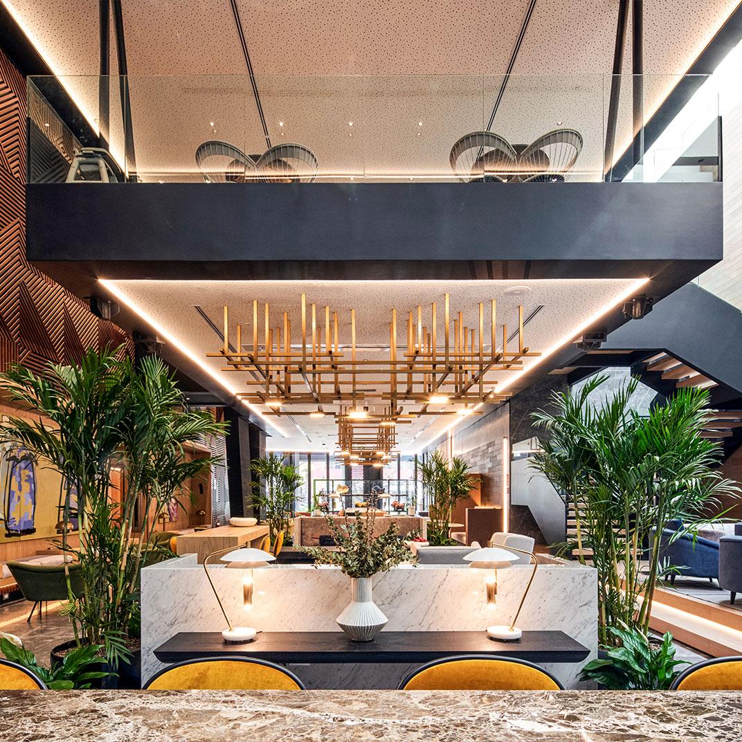 Modern chandelier installed in a premium hospitality interior.