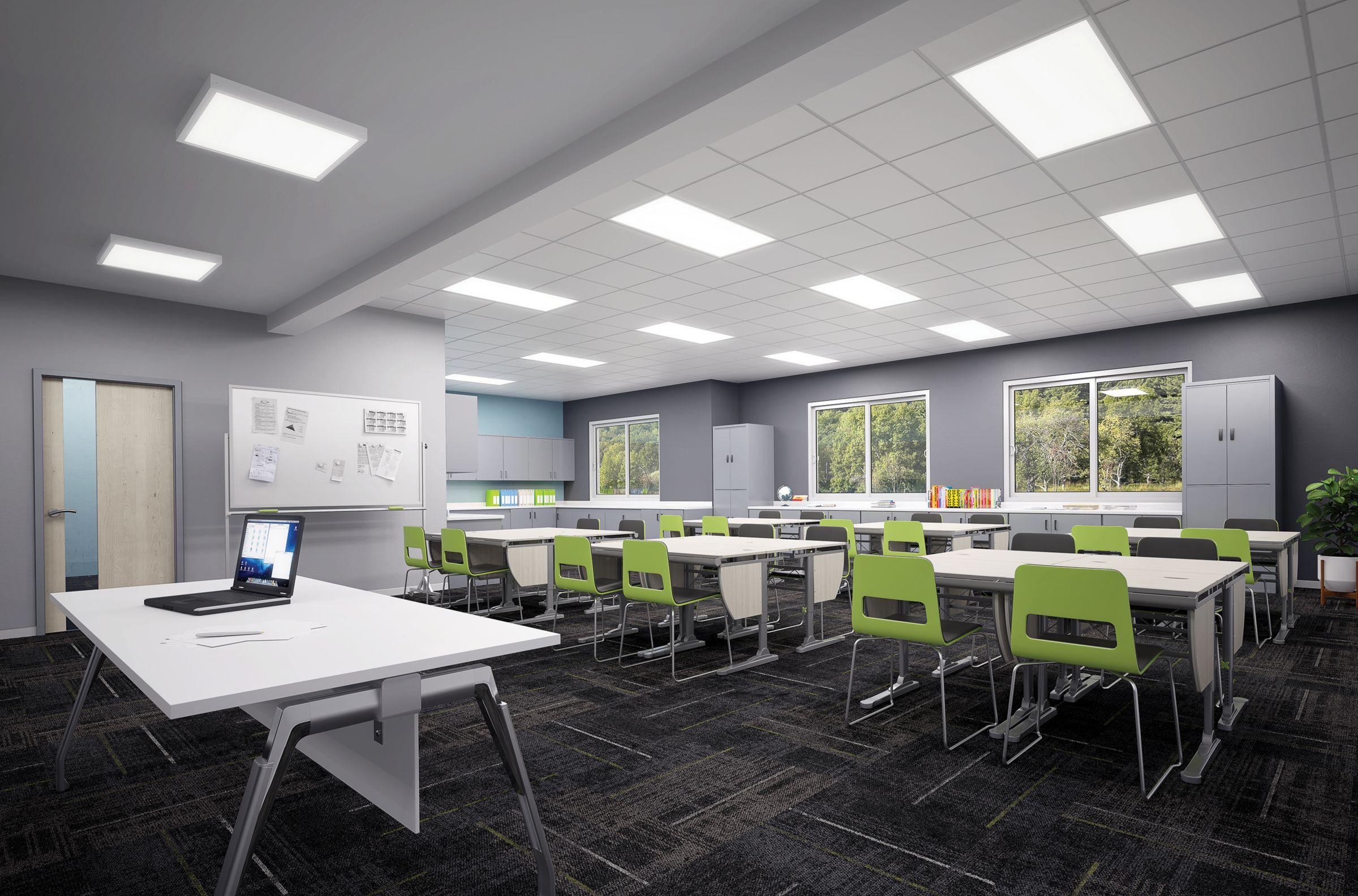 Recessed panel lights installed in a contemporary classroom environment.
