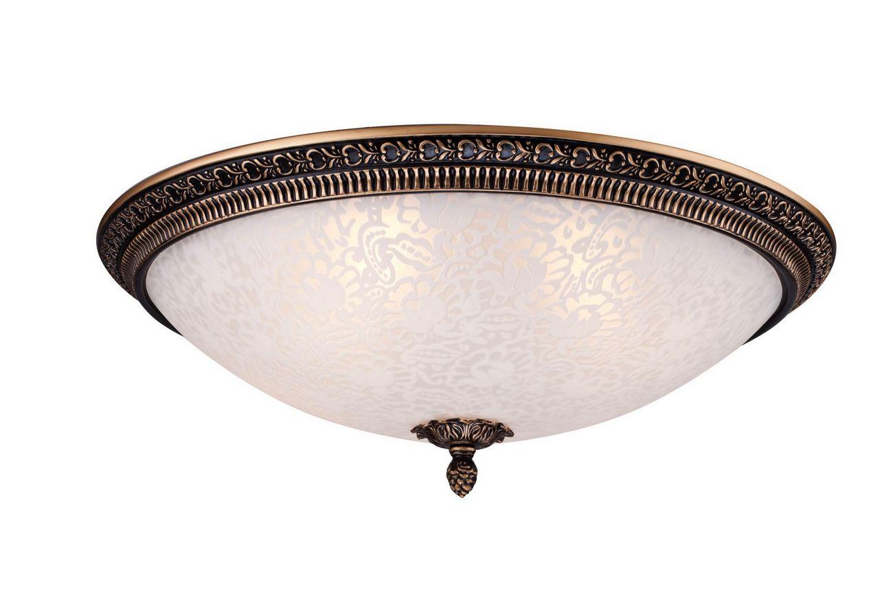Classic brass ceiling light with frosted glass and traditional decorative detailing on a white background