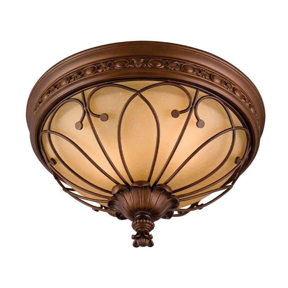 Classic brass ceiling light with frosted glass and traditional decorative detailing on a white background