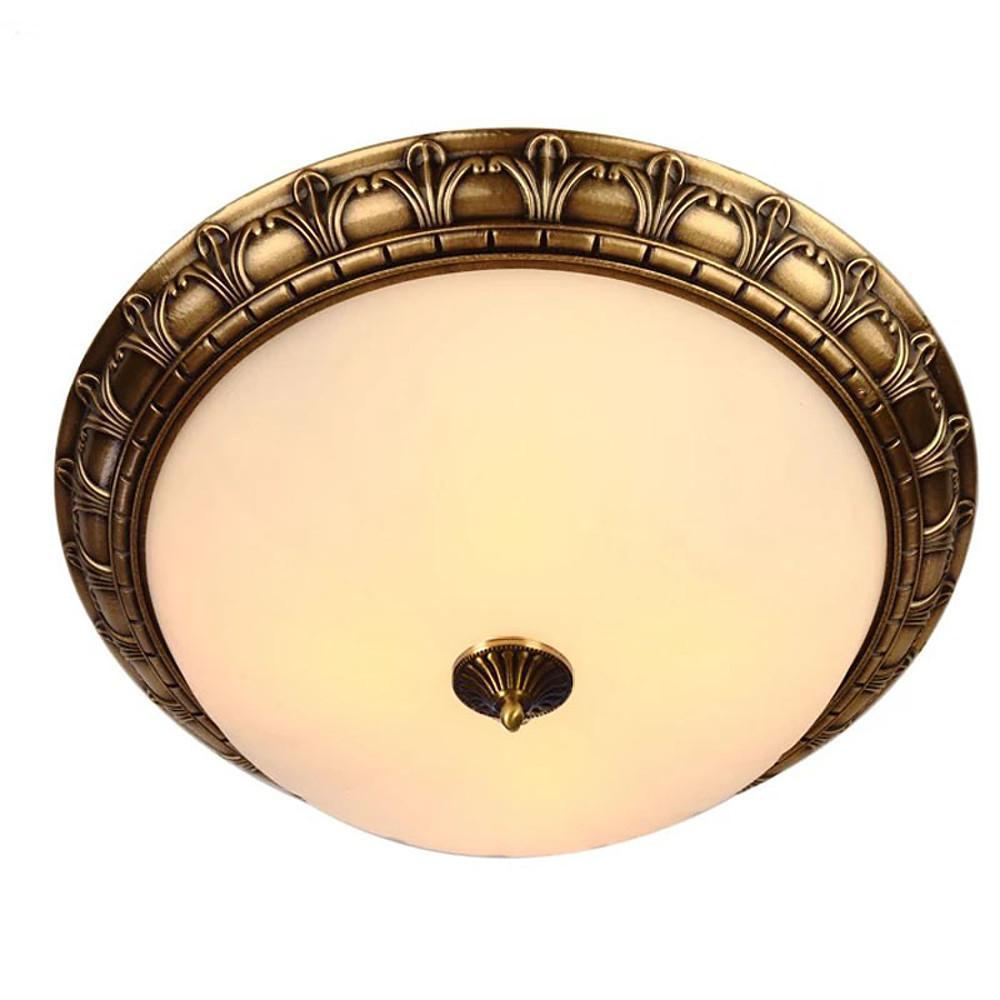 Classic brass ceiling light with frosted glass and traditional decorative detailing on a white background