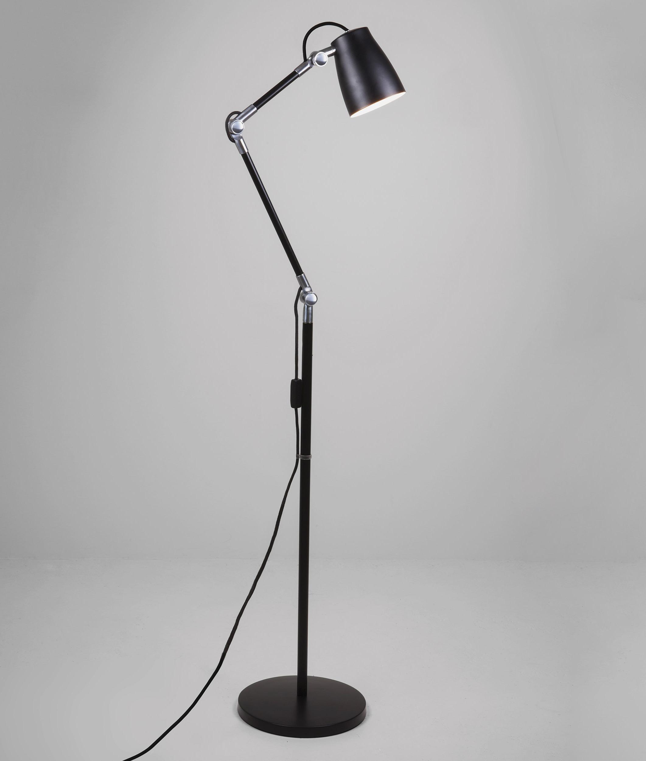 Front view of a reading floor lamp highlighting its ergonomic design and precision task lighting capabilities.