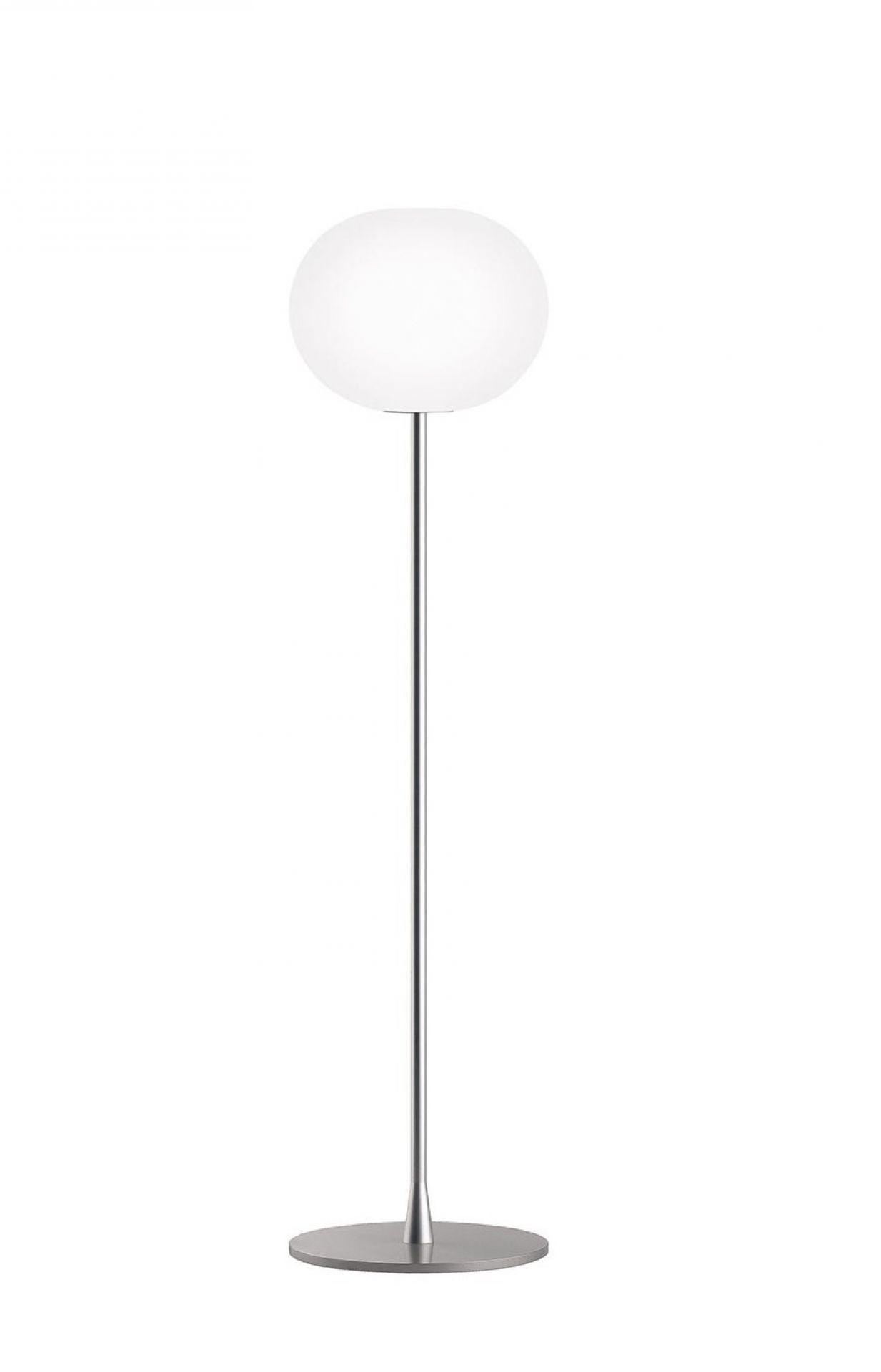 Globe floor lamp photographed on a clean white background showcasing an opal glass sphere and premium metal structure.