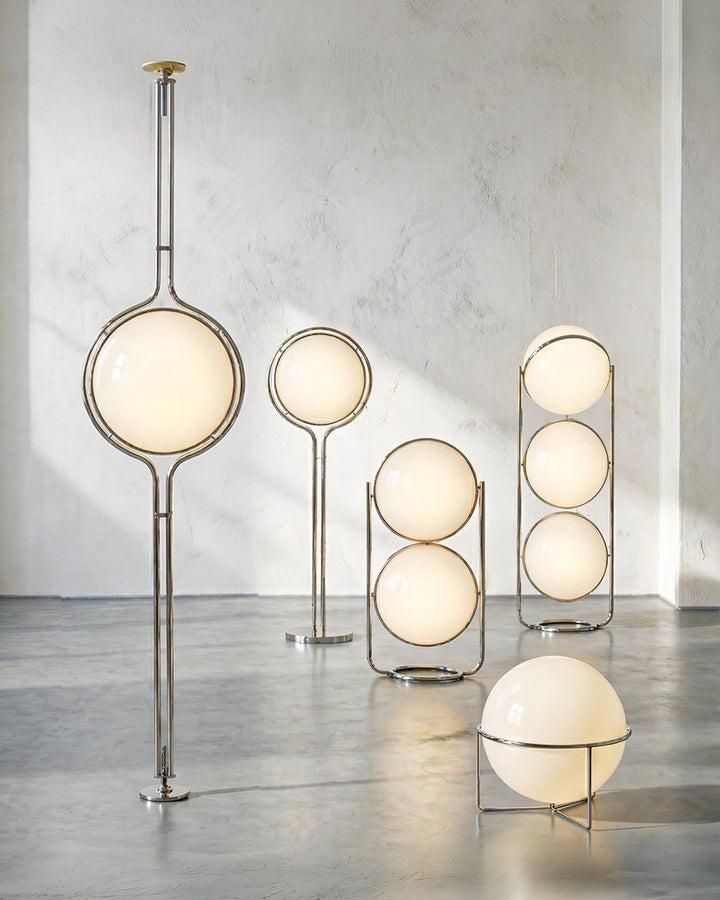 Collection of globe floor lamps featuring opal glass diffusers and premium decorative finishes for contemporary interiors.