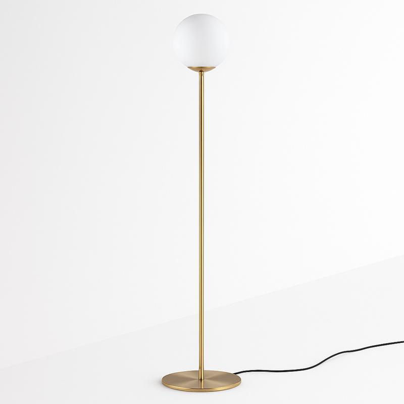 Front view of a globe floor lamp highlighting its elegant spherical diffuser and refined architectural proportions.