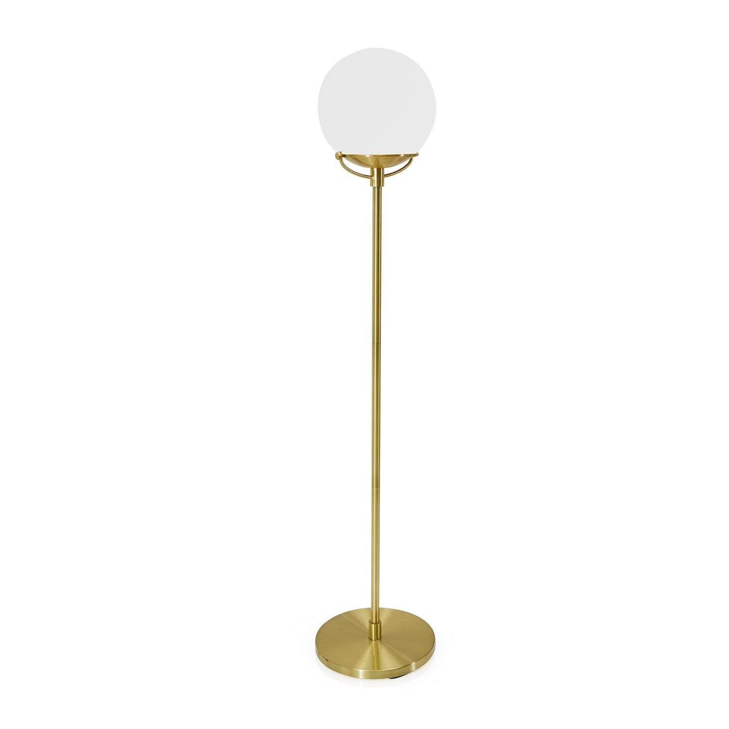 Globe floor lamp photographed on a clean white background showcasing an opal glass sphere and premium metal structure.