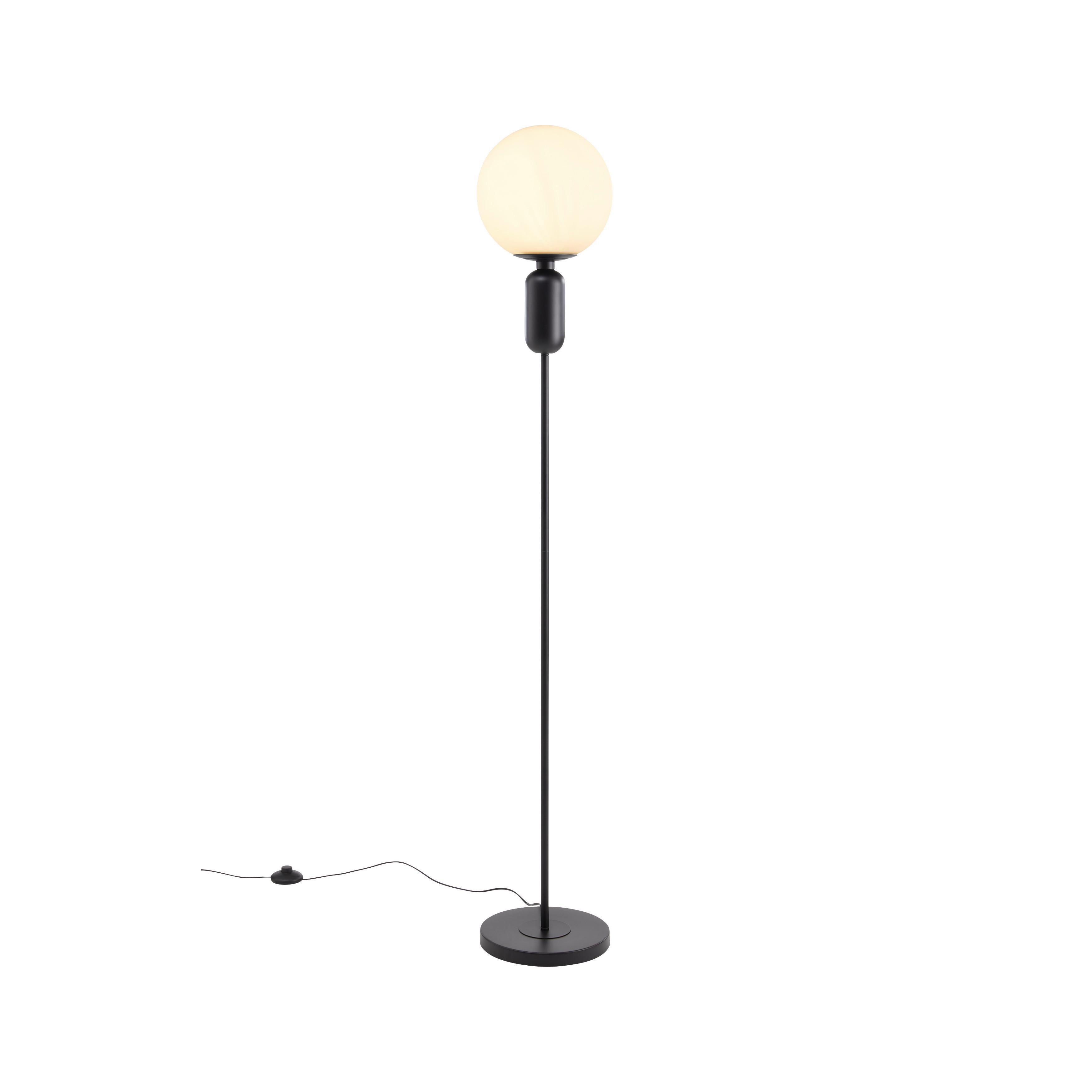 Globe floor lamp photographed on a clean white background showcasing an opal glass sphere and premium metal structure.