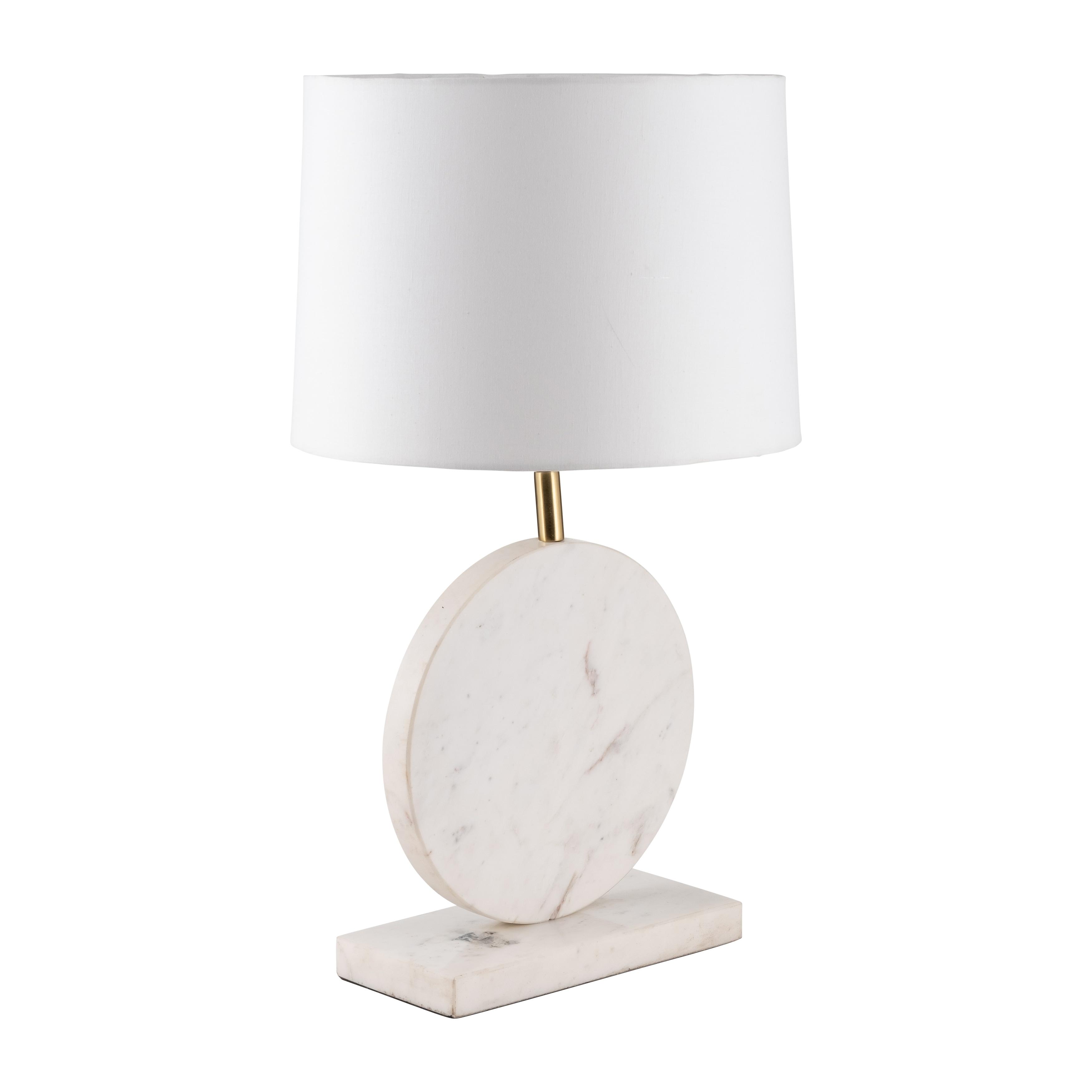Marble table lamp photographed on a clean white background highlighting the natural stone base and premium finishes.