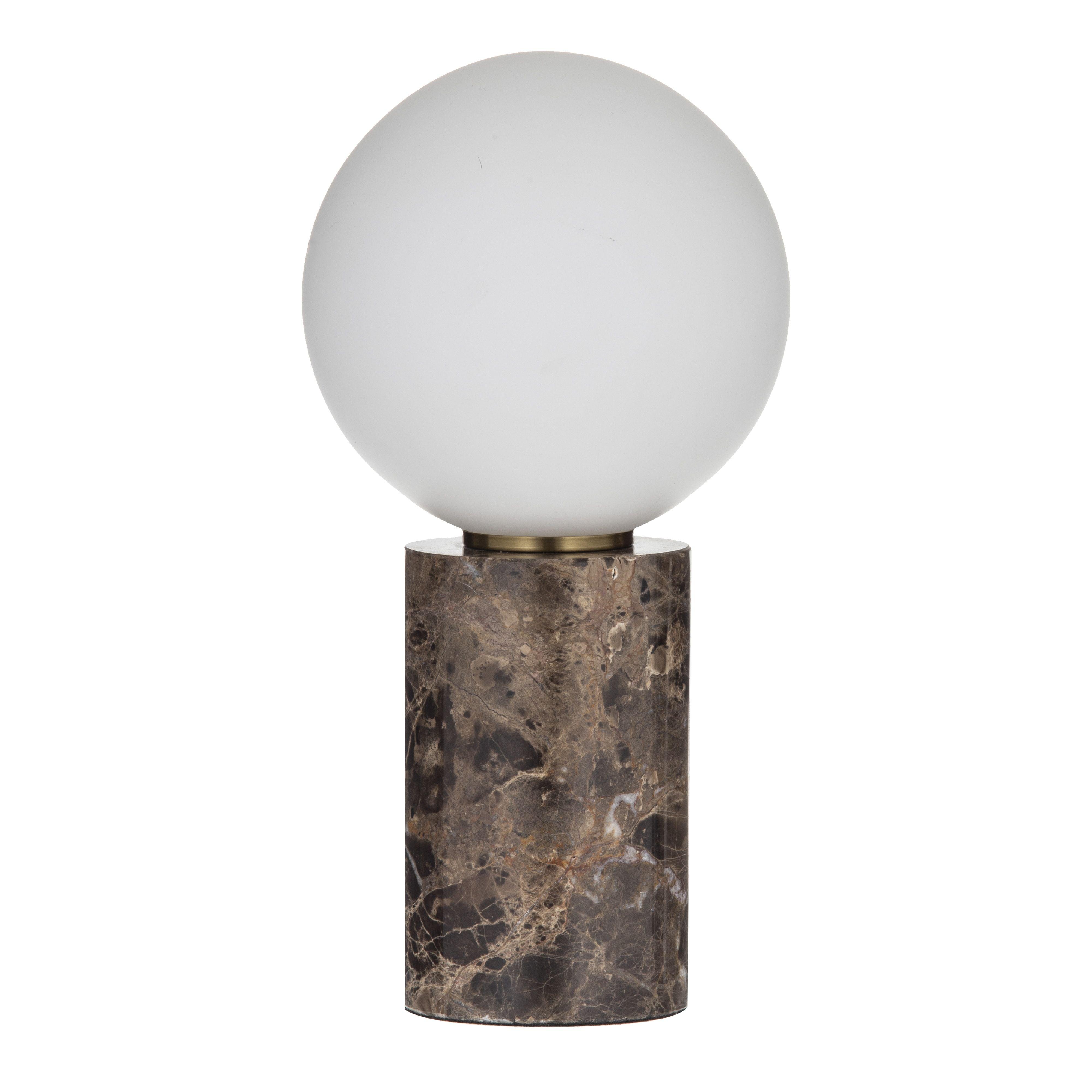 Marble table lamp photographed on a clean white background highlighting the natural stone base and premium finishes.