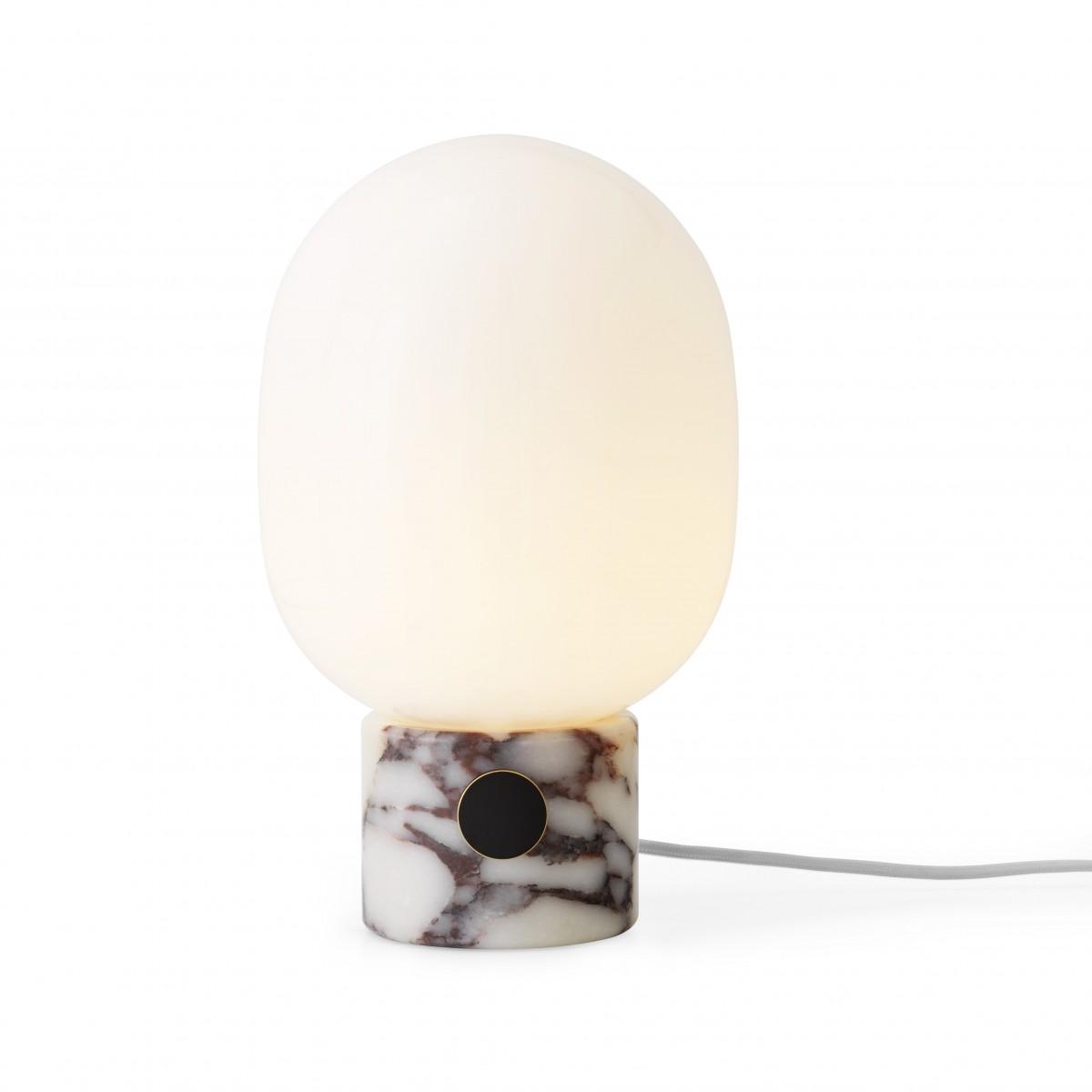 Marble table lamp photographed on a clean white background highlighting the natural stone base and premium finishes.