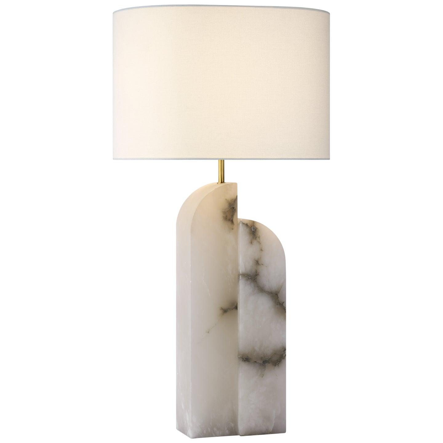 Marble table lamp photographed on a clean white background highlighting the natural stone base and premium finishes.