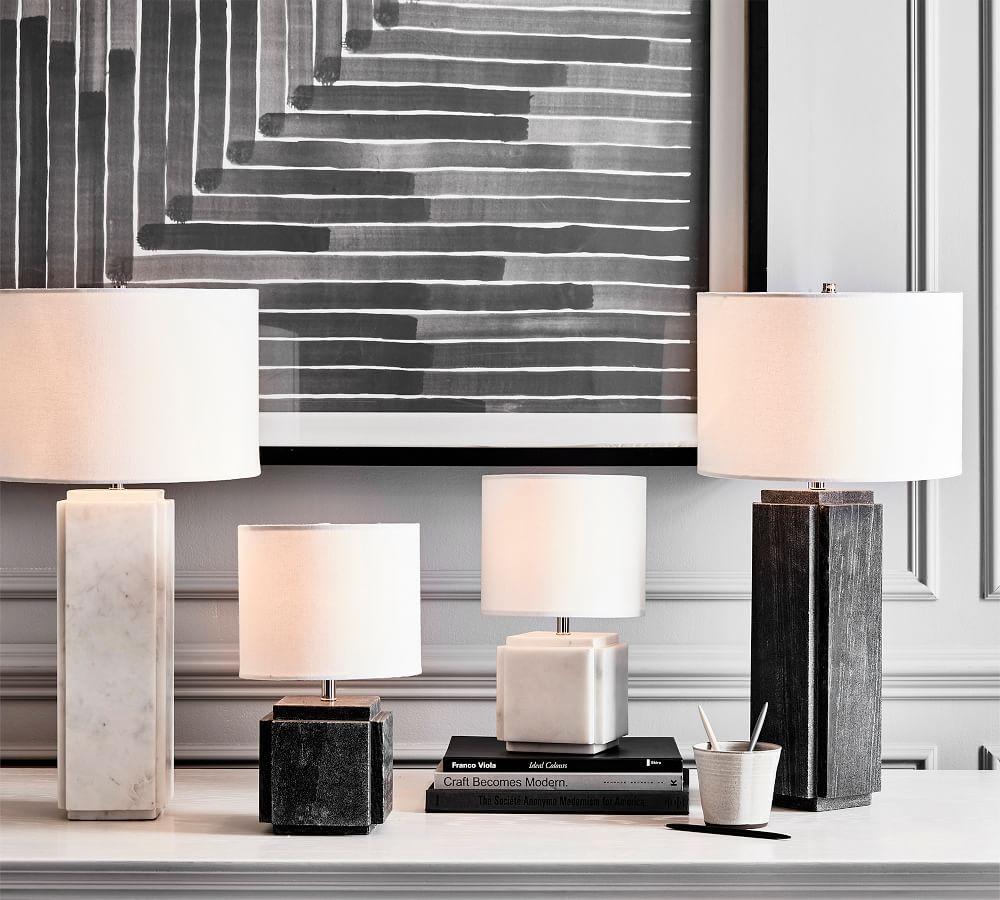 Collection of marble table lamps featuring premium natural stone bases and sophisticated contemporary designs.