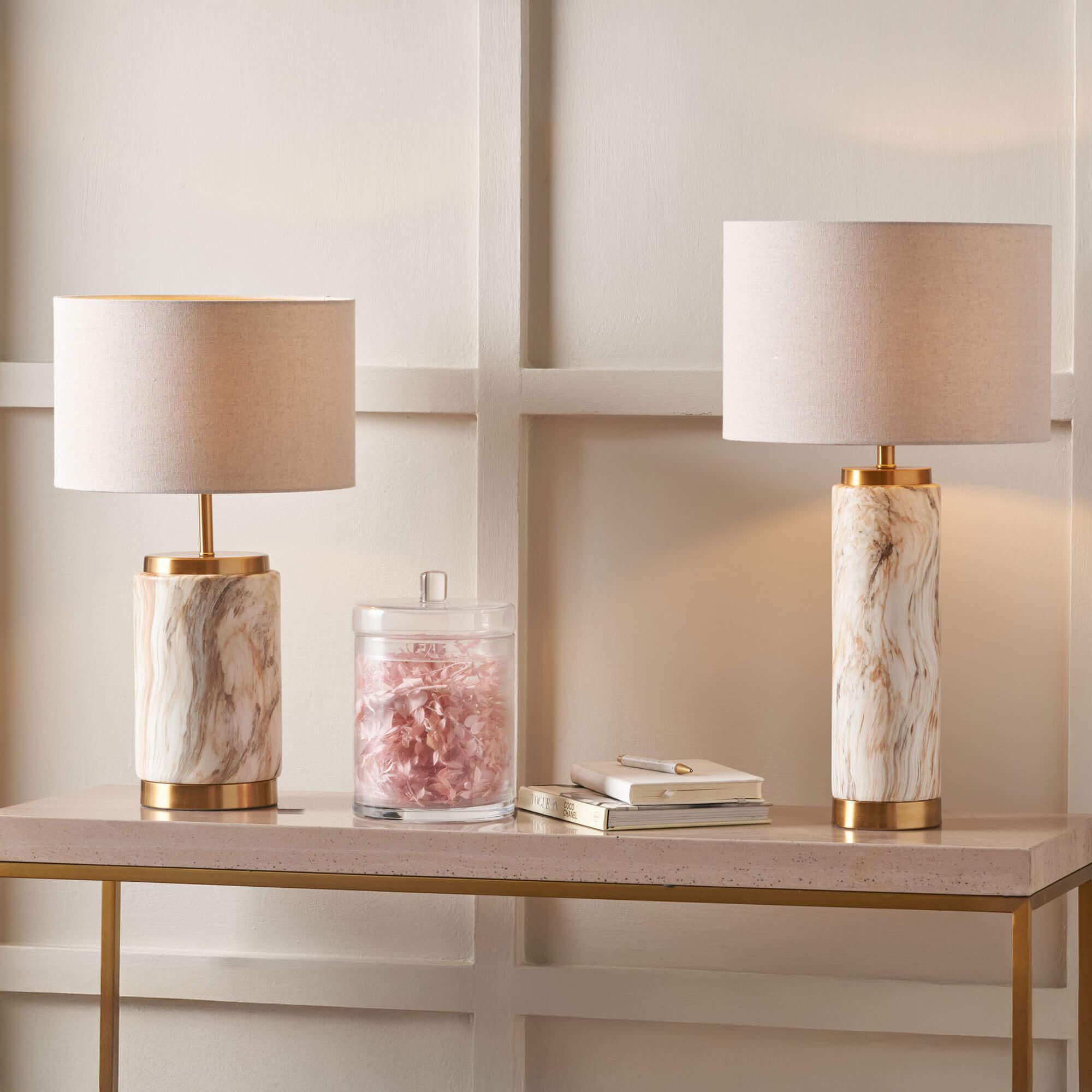 Collection of marble table lamps featuring premium natural stone bases and sophisticated contemporary designs.