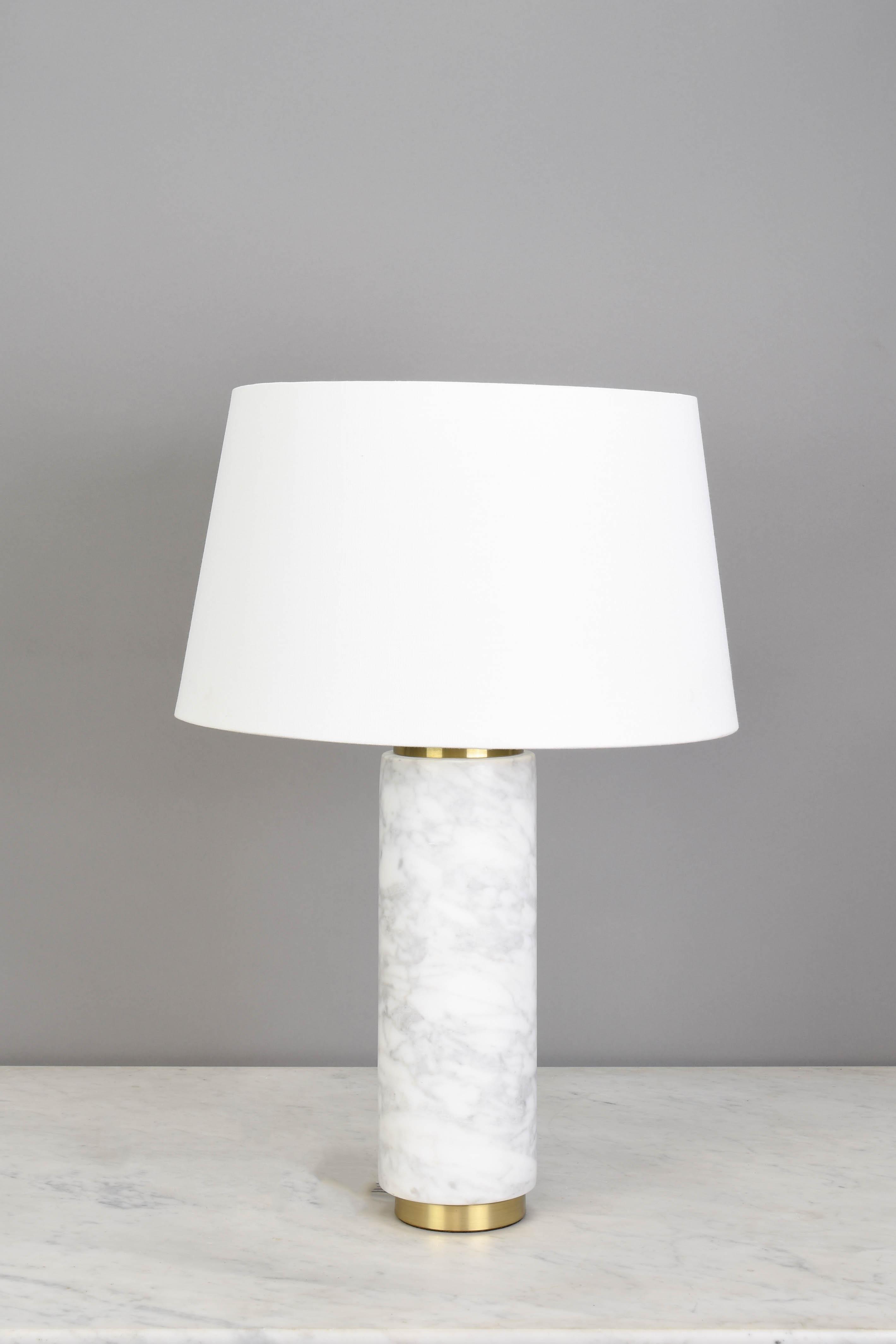 Front view of a marble table lamp showcasing elegant proportions, luxurious materials and refined detailing.