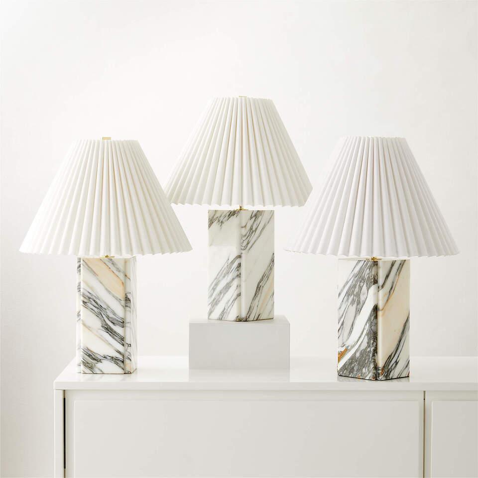 Collection of marble table lamps featuring premium natural stone bases and sophisticated contemporary designs.