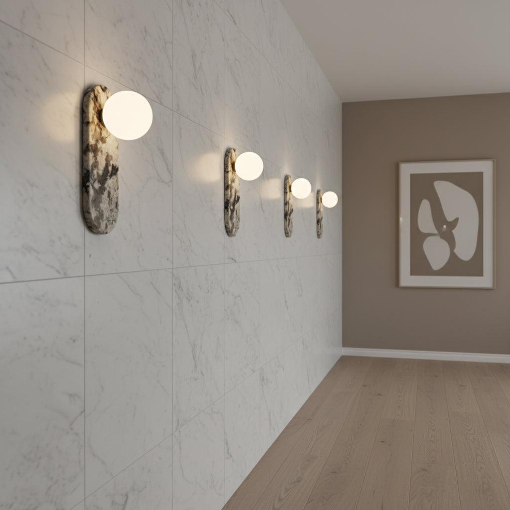 Luxury marble wall lamp installed in an elegant hotel corridor, creating warm architectural ambient lighting.