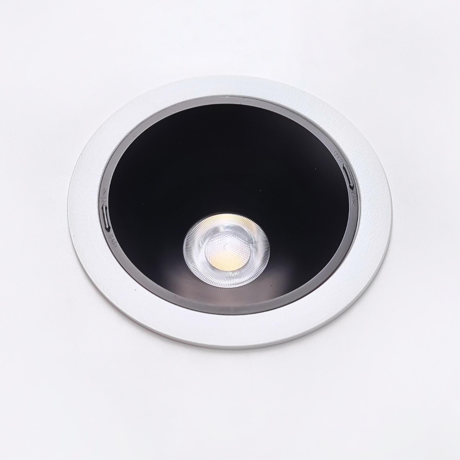 Front view of a waterproof recessed downlight with a sealed trim.