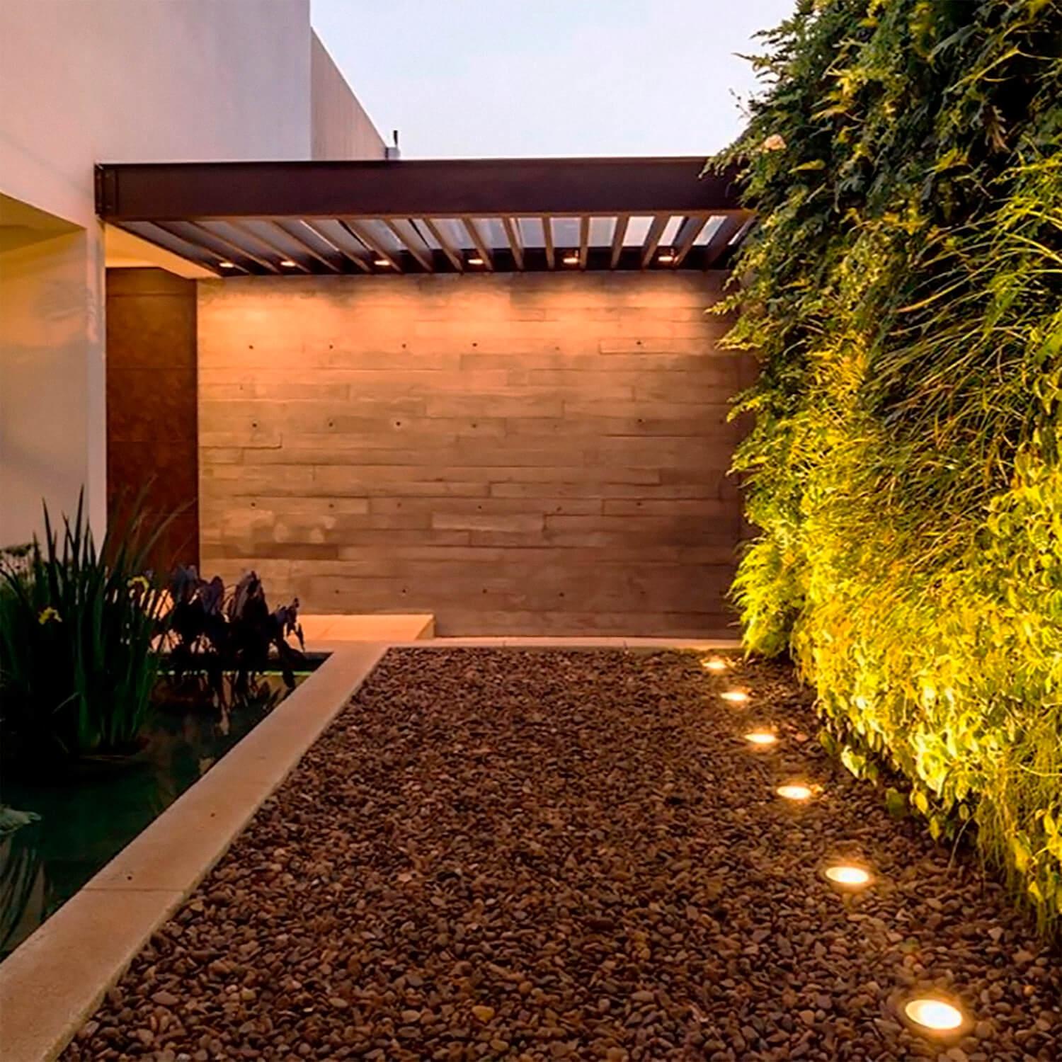 Mini inground lights installed in a contemporary landscape project.