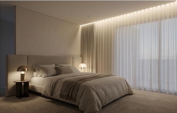 Curtain cove lighting integrated into a contemporary hospitality interior with floor-to-ceiling curtains.