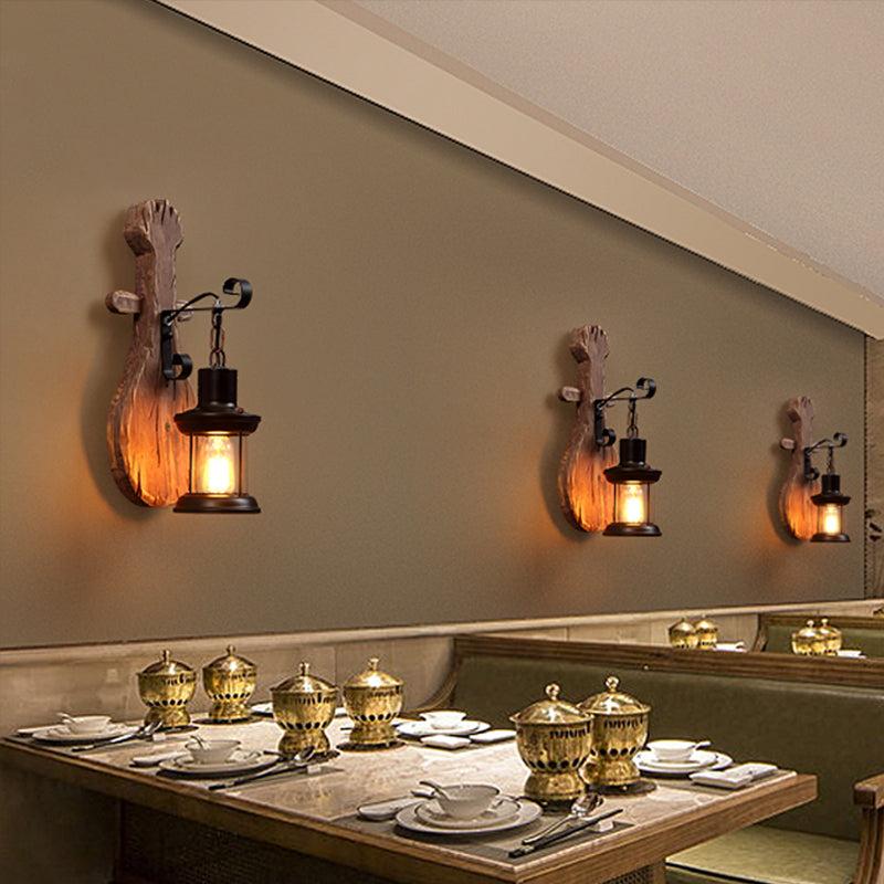 Rustic wall lamp installed in a luxury mountain lodge with warm architectural interiors.