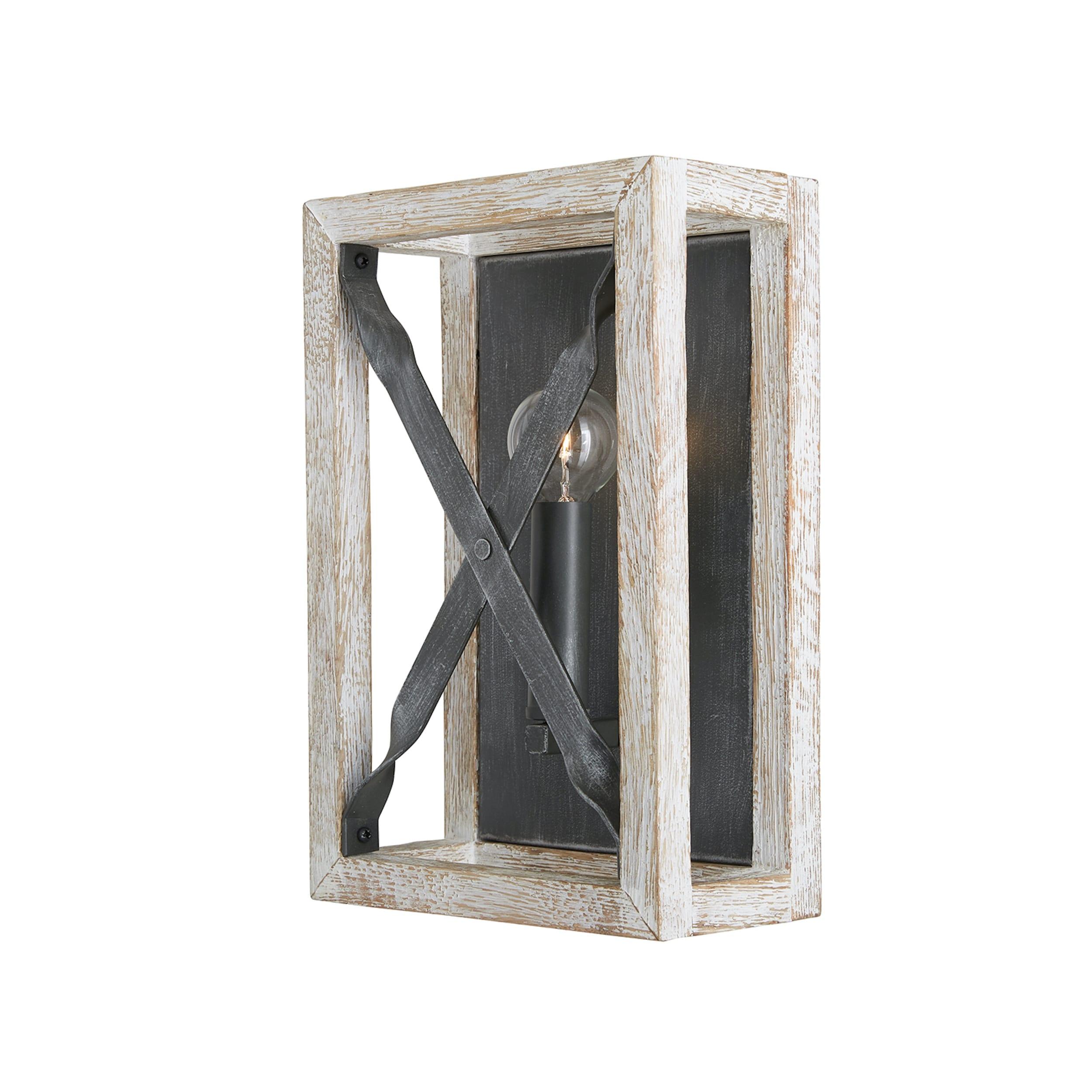 Rustic wall lamp featuring wood and wrought iron photographed on a clean white studio background.