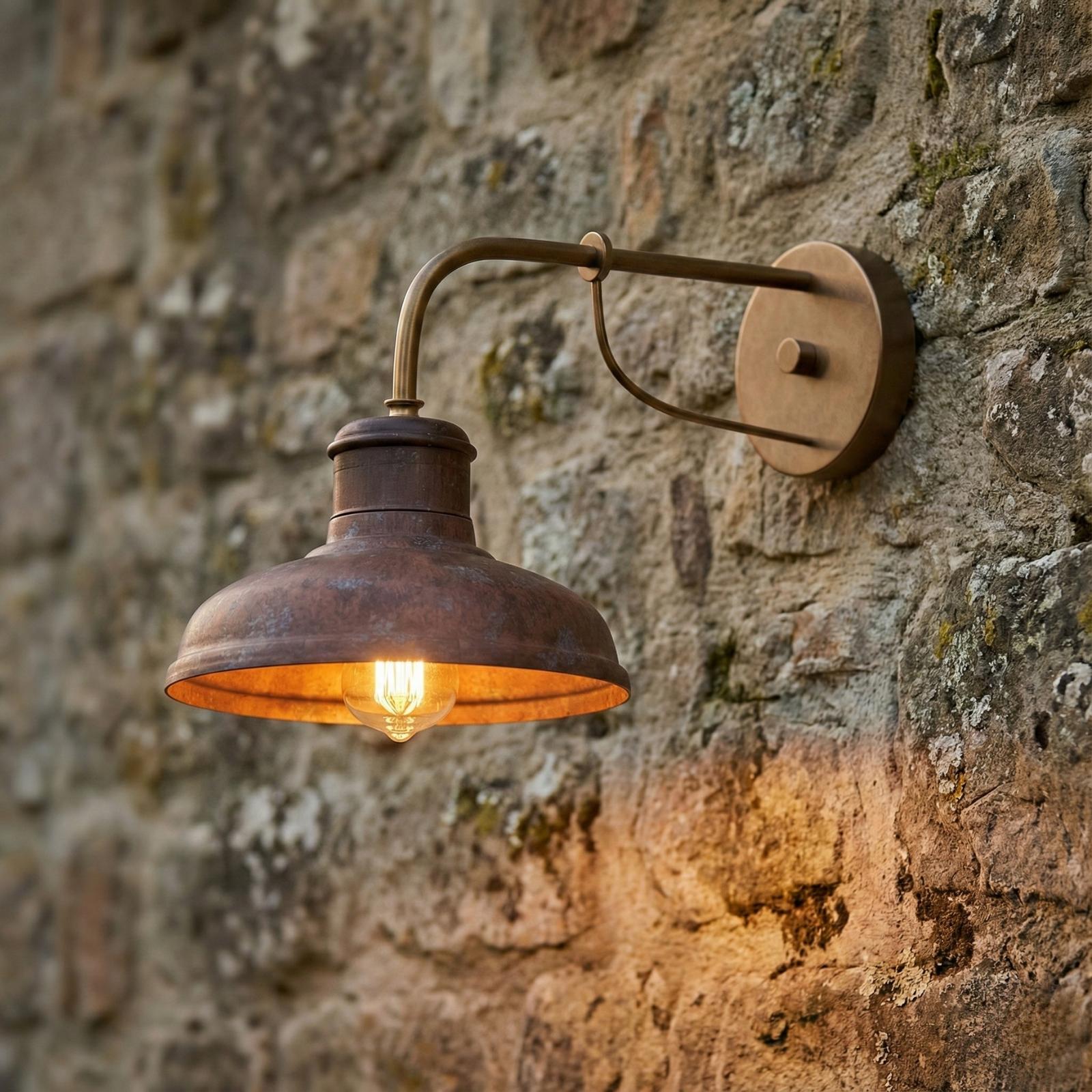 Rustic wall lamp installed in a luxury mountain lodge with warm architectural interiors.
