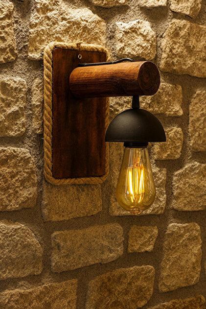 Rustic wall lamp installed in a luxury mountain lodge with warm architectural interiors.