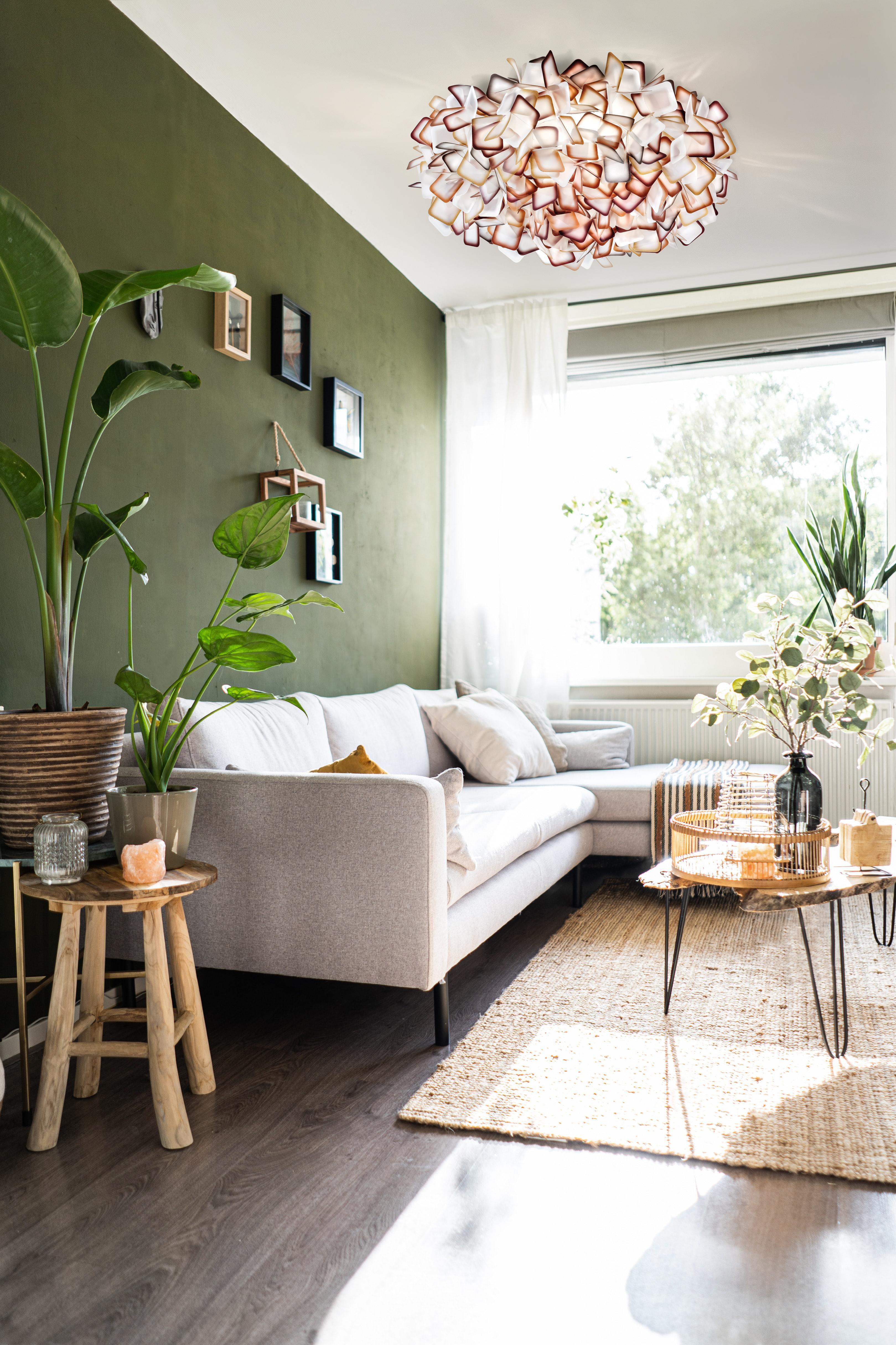 Organic ceiling light creating a soft decorative atmosphere in a contemporary residential living room