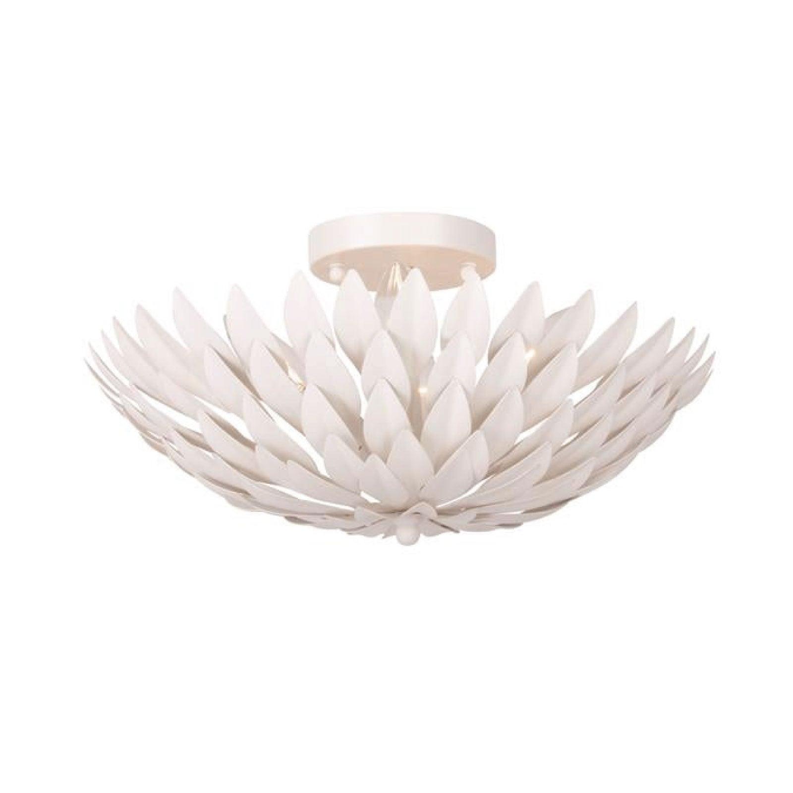 Organic ceiling light inspired by overlapping leaves and petals on a white background