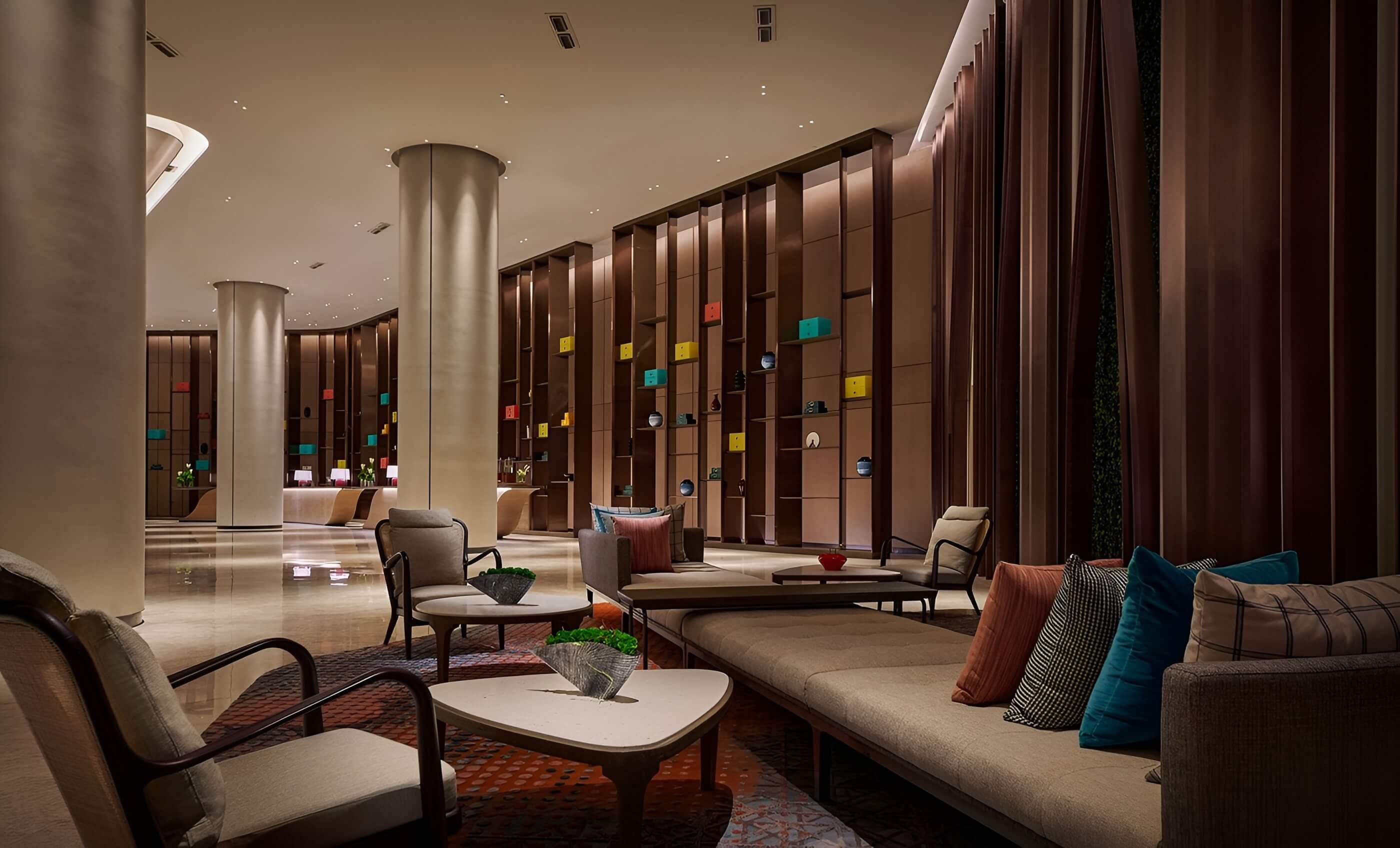 Decorative reflector downlights installed in a premium hospitality interior.