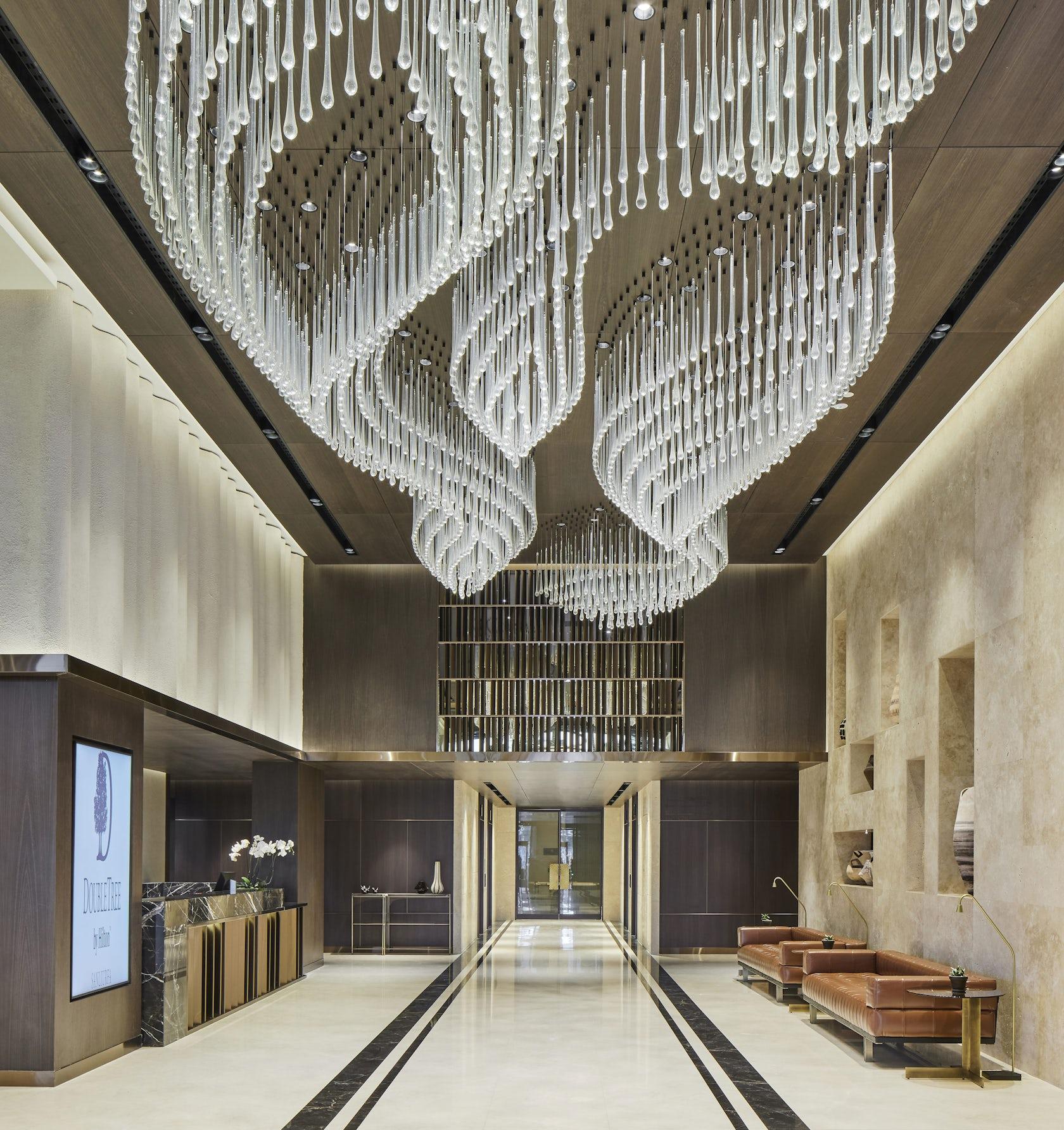 Bespoke chandelier installed in a luxury hospitality project.