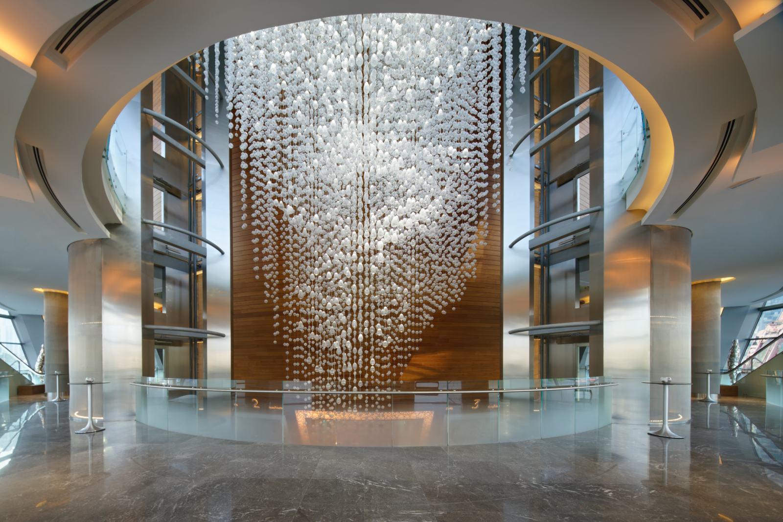 Bespoke chandelier installed in a luxury hospitality project.