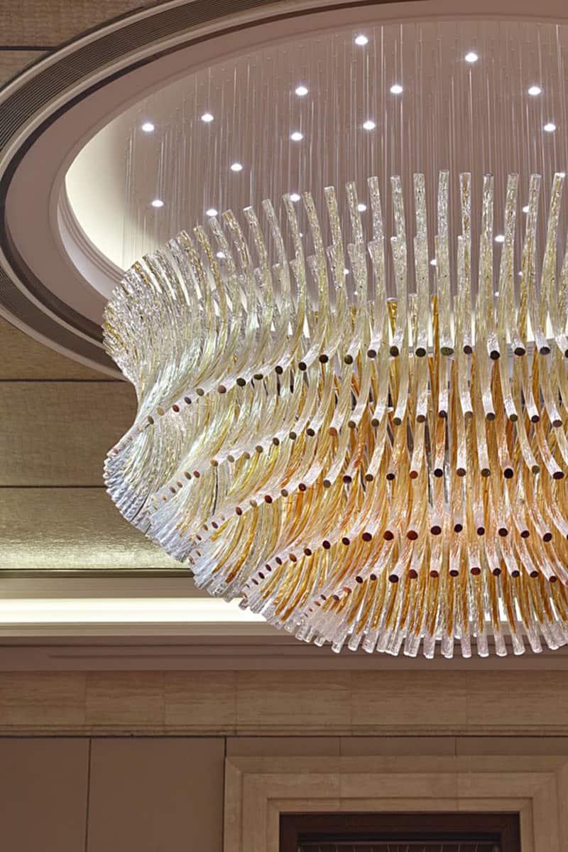 Bespoke chandelier installed in a luxury hospitality project.