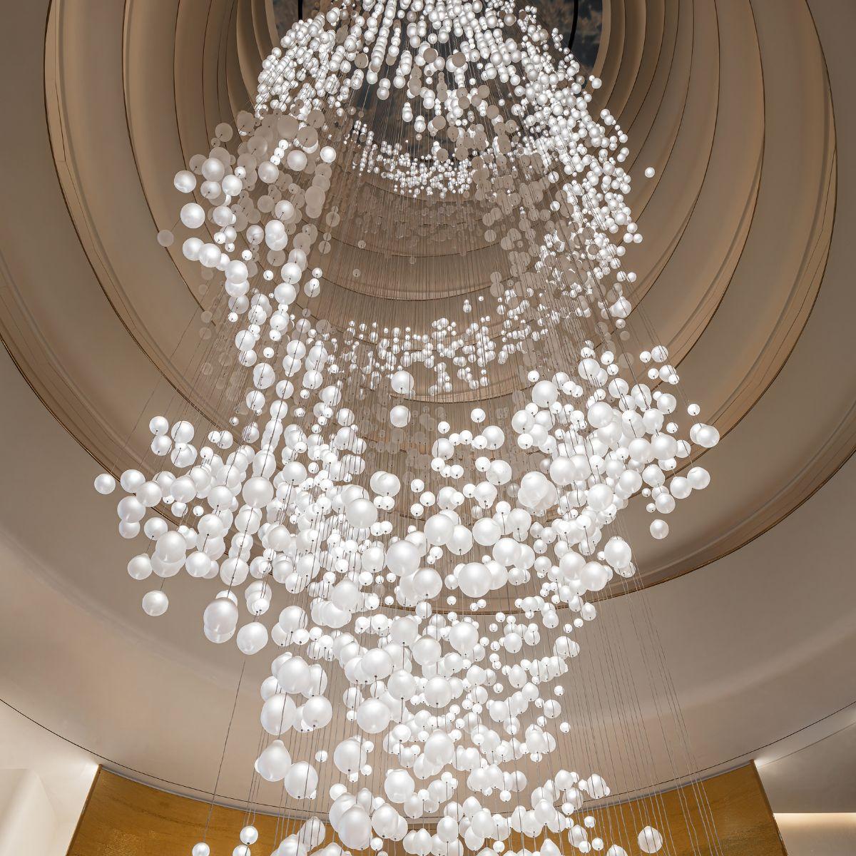 Bespoke chandelier installed in a luxury hospitality project.