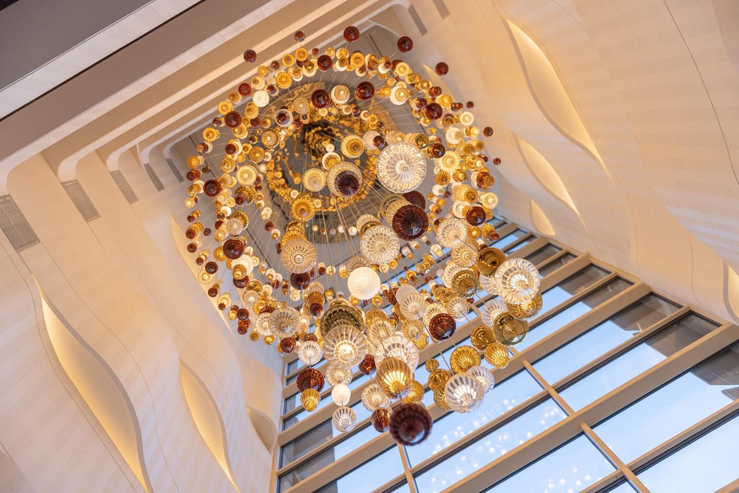 Bespoke chandelier installed in a luxury hospitality project.
