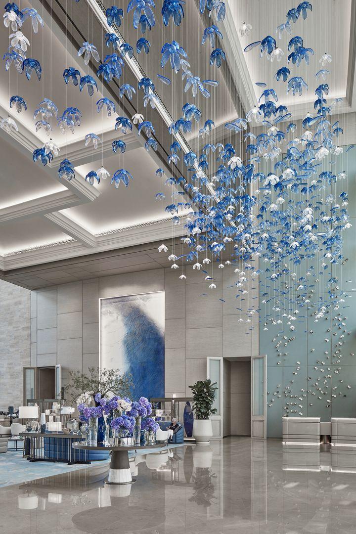 Bespoke chandelier installed in a luxury hospitality project.
