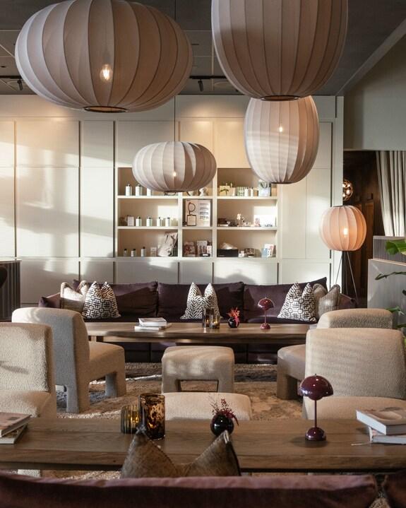 Fabric pendant lighting installed in a premium hospitality interior.