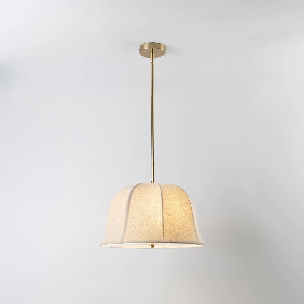 Front view of a decorative fabric pendant light for architectural interiors.