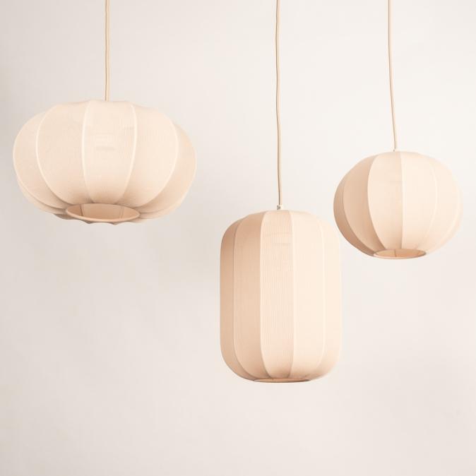 Fabric Fabric pendant lighting family featuring multiple sizes and design variations.pendant lighting family featuring multiple sizes and design variations.