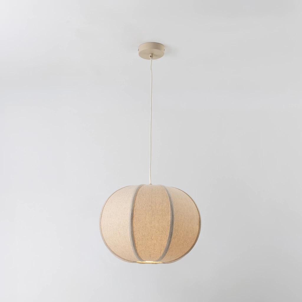 Front view of a decorative fabric pendant light for architectural interiors.