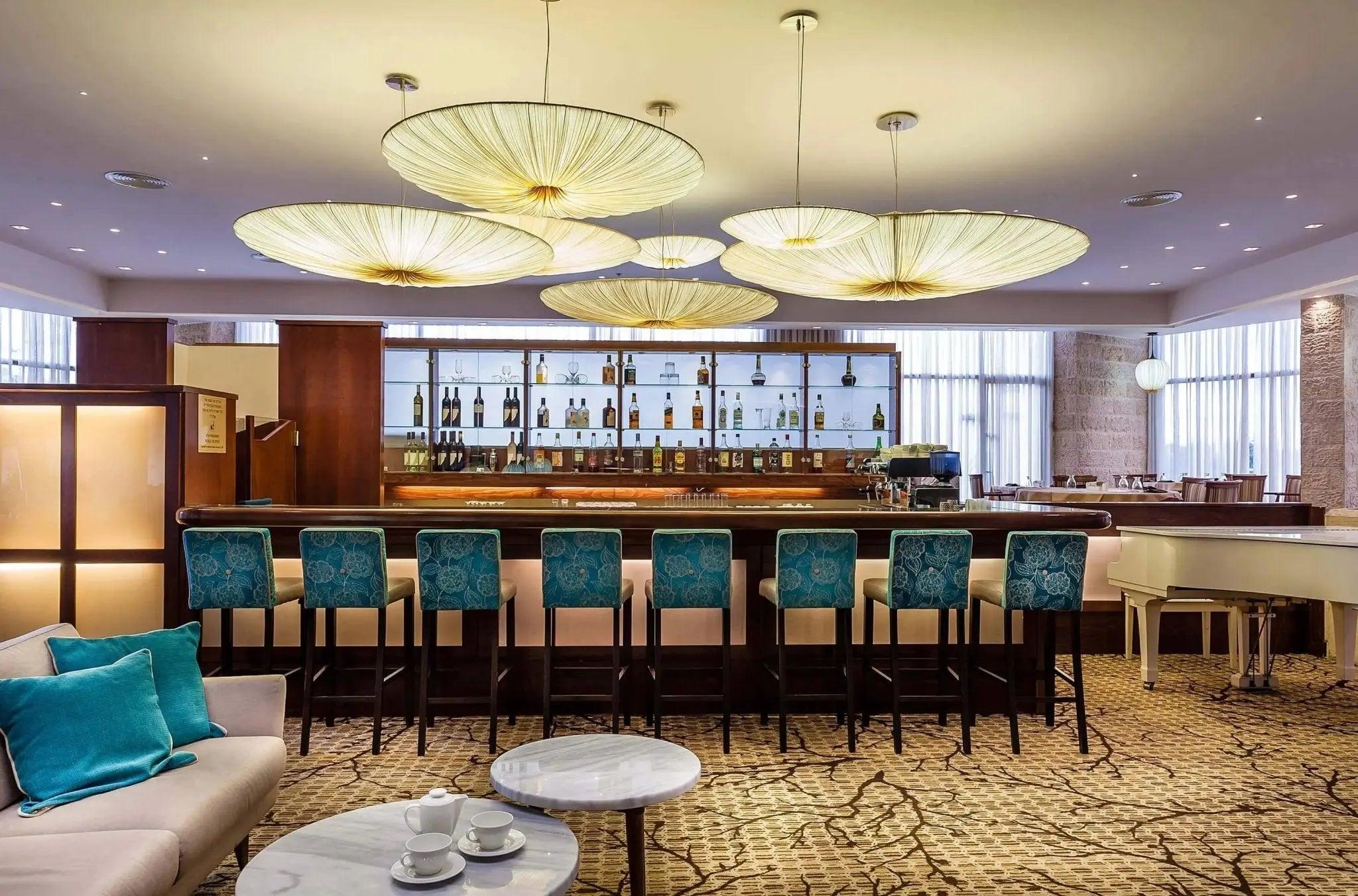 Fabric pendant lighting installed in a premium hospitality interior.