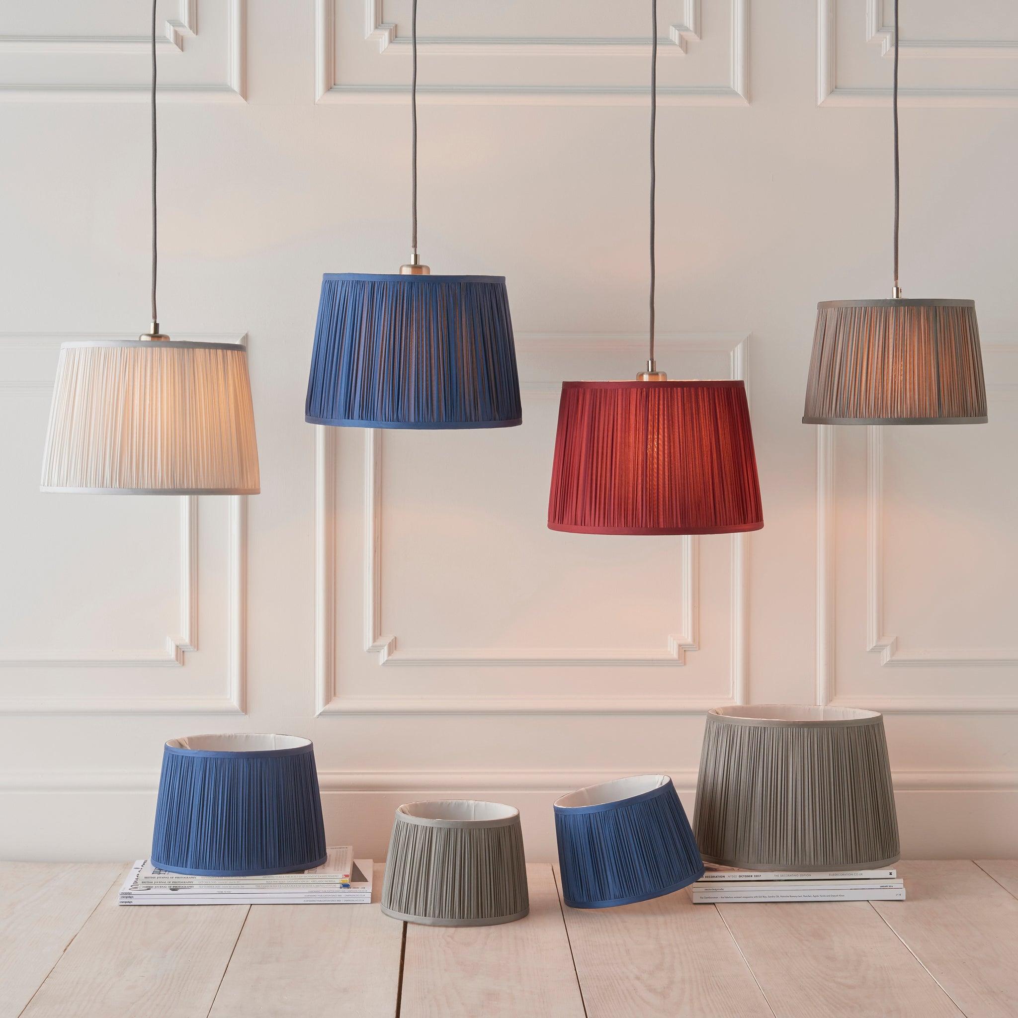 Fabric pendant lighting family featuring multiple sizes and design variations.