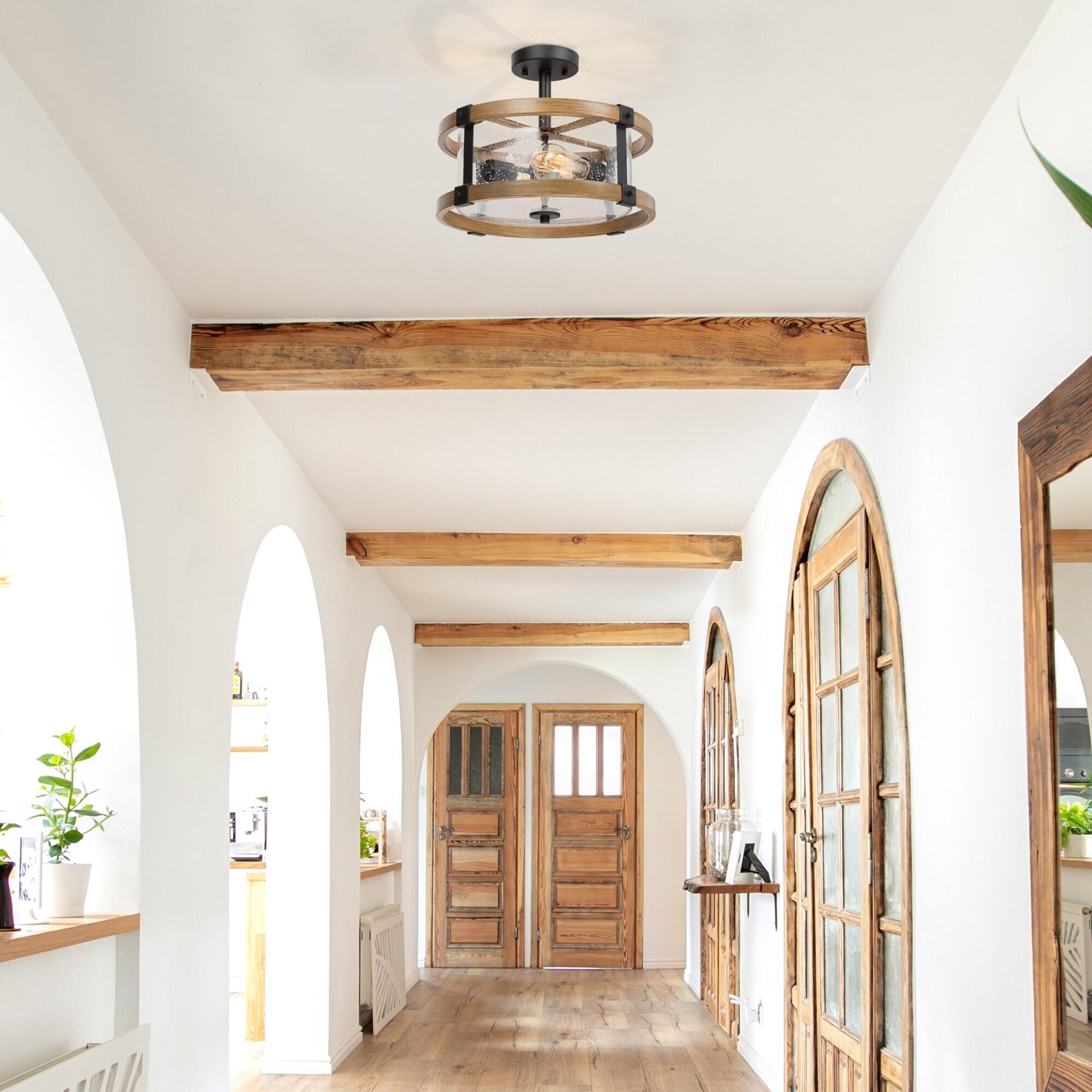 A warm decorative ceiling light combining aged materials, traditional textures and a relaxed farmhouse-inspired character.